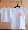 Picture of Детска тениска с оранжево име и номер на гърба